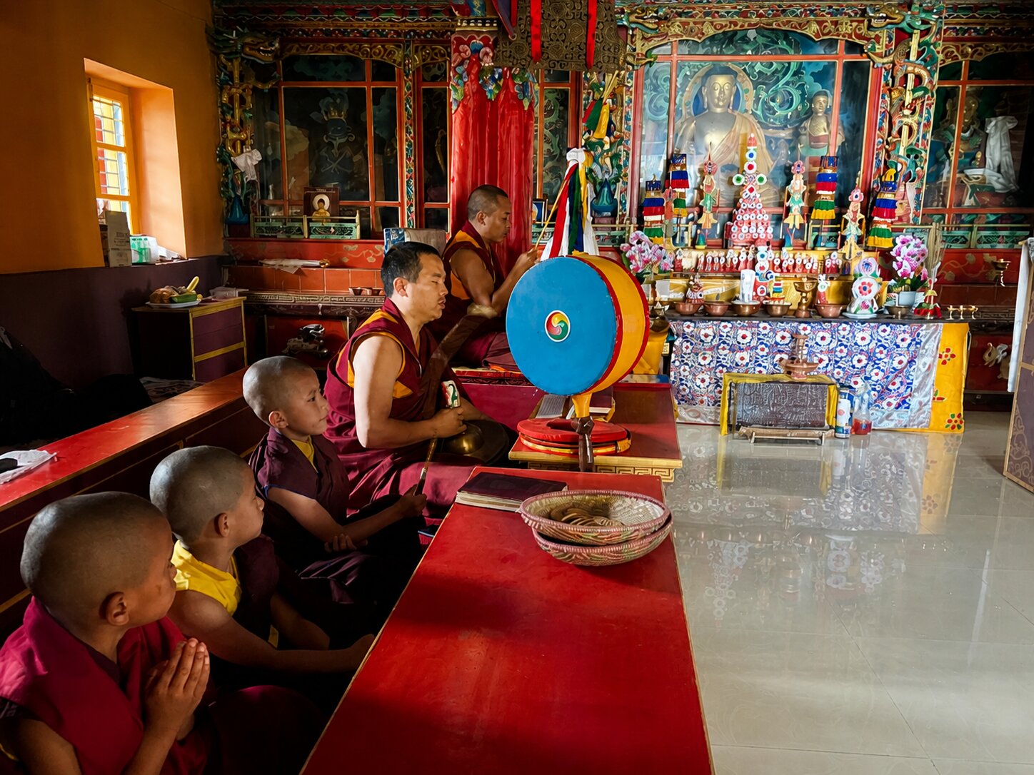 Monks during prayer at Ging Monastery
